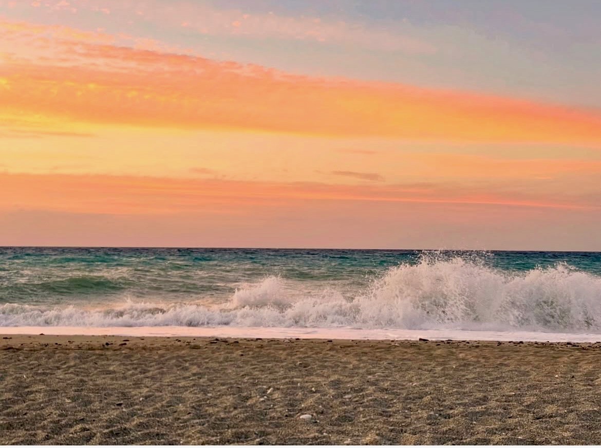 Beautiful summer sunset at Platanes Beach Rethymno Greece
