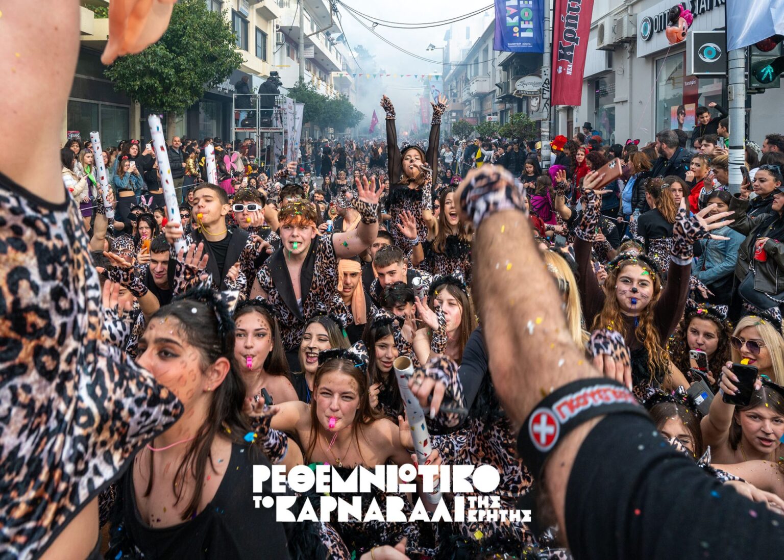 Masked dancers celebrating in the streets of Rethymno